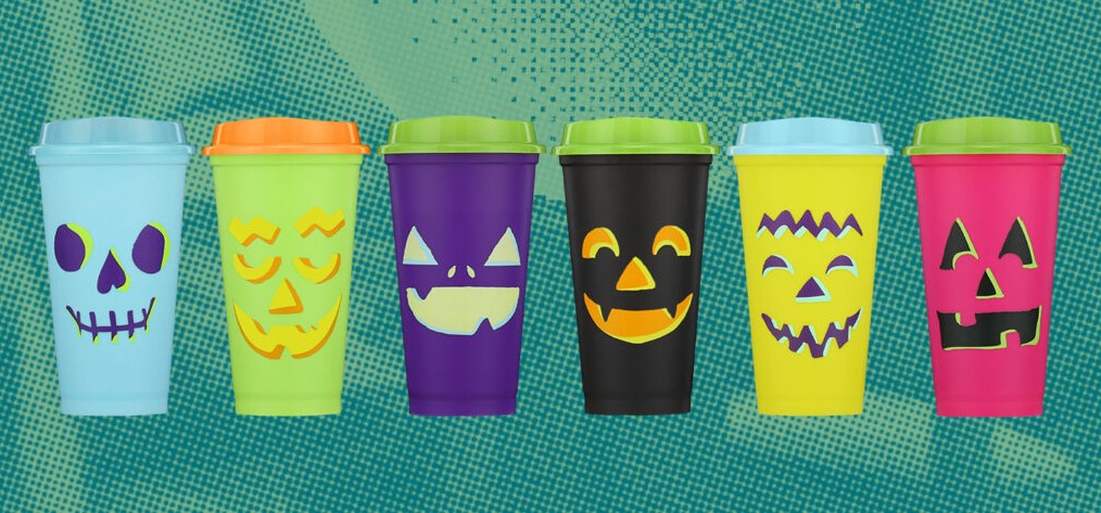 Starbucks Halloween-themed reusable cups in bright colors with spooky designs, part of a limited-edition collection.