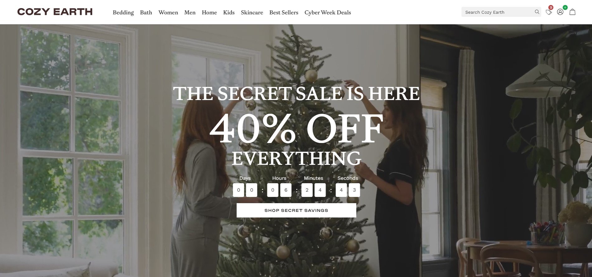 Cozy Earth homepage displaying a festive 40% off sale on luxurious bedding and home essentials.