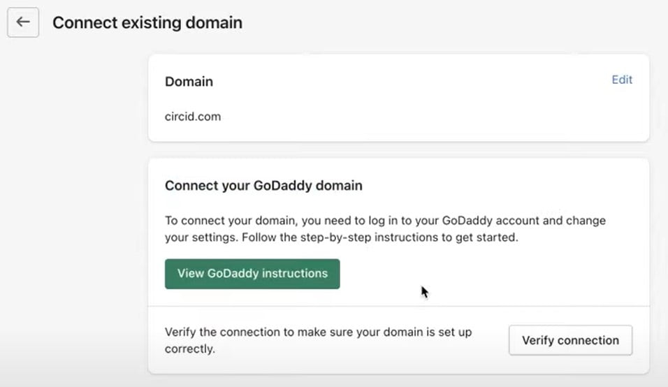 Shopify domain verification process for connecting a GoDaddy domain to a Shopify store