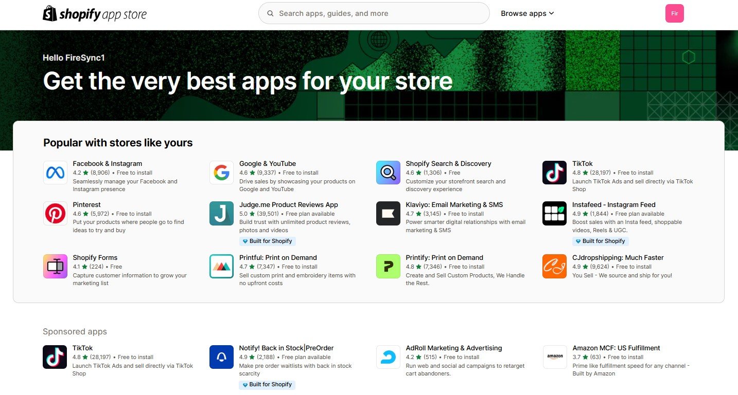 Shopify App Store homepage showcasing top apps and categories for e-commerce businesses.