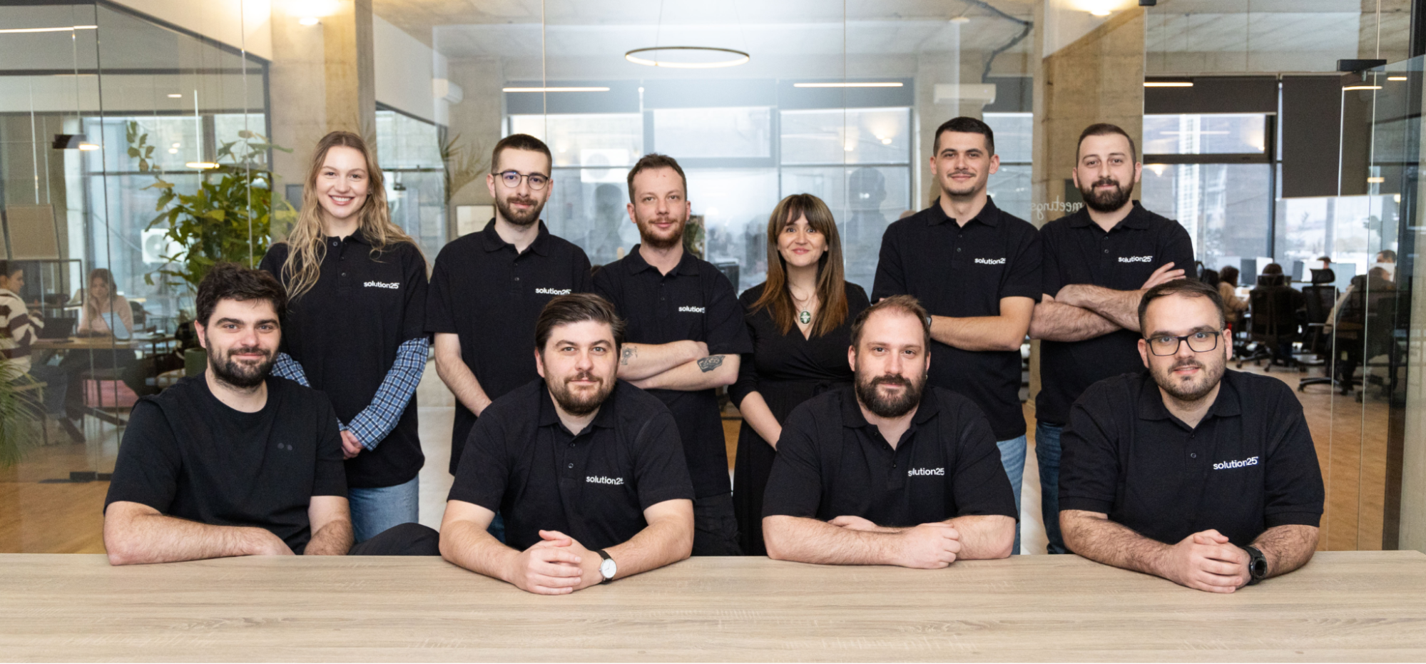 Solution25 eCommerce development and design team in office environment